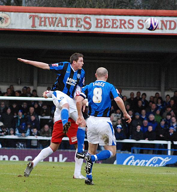 Ciaran Toner wins an aerial battle.