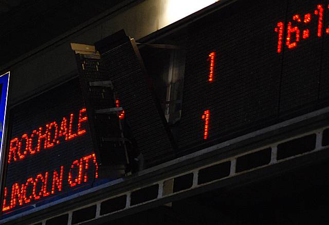 The Spotland scoreboard has seen better days.