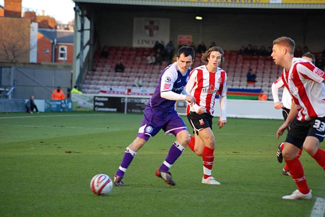 Chris Dagnall lays off a pass.