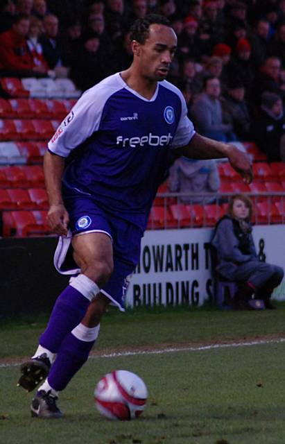 Rochdale have signed Chris O'Grady from Oldham on a two-and-a-half year deal.