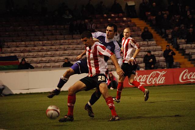 Eric Lichaj shields the ball away from Dagnall.