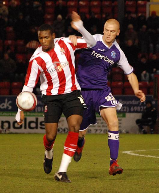 Jason Taylor (right) has been linked with a permanent move to Rochdale during the January transfer window.