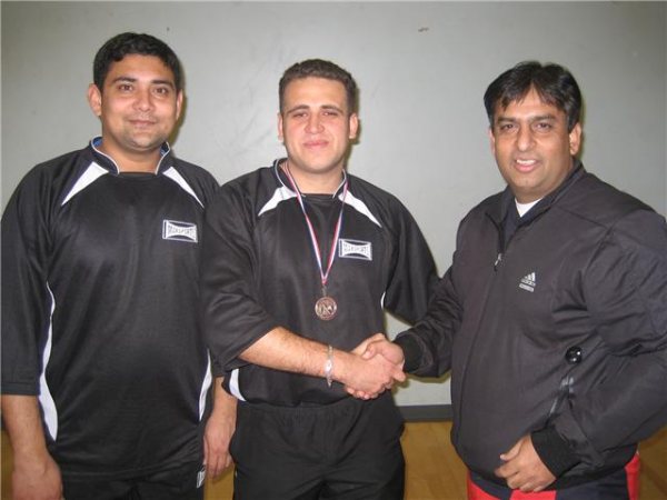 Saif Receives his man of the match medal from Siddique.