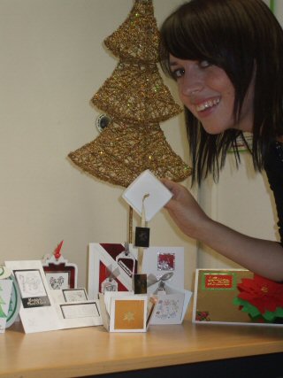 Hollin staff member Georgina Costigan and a selection of the cards produced at the session.

 

