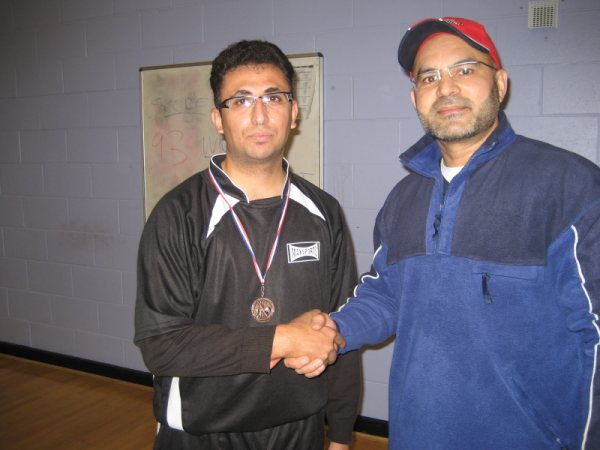 Shakir receives his man-of-the-match award.