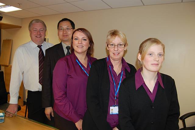 GP’s Dr Little and Dr Zheng with reception staff. 