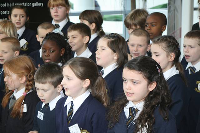 St Peter's children continue their singing.