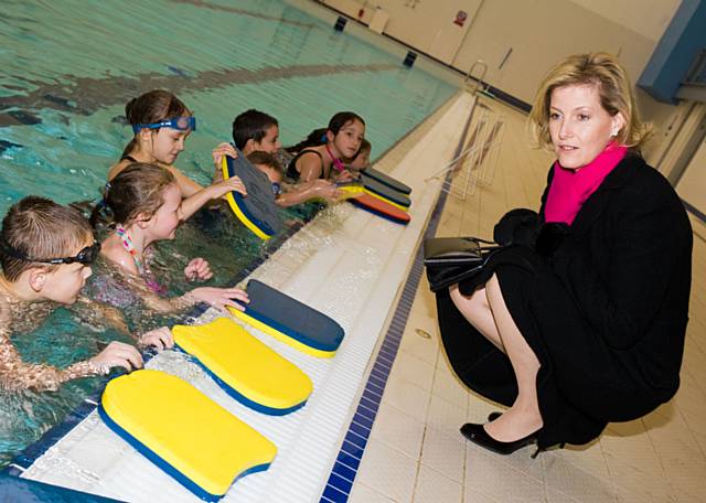 Sophie Wessex chats to local school children in the arena's swimming pool.