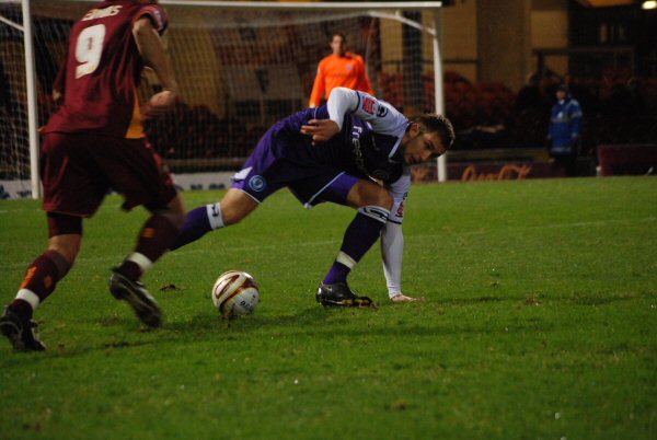 Craig Dawson comes away with the ball following a challenge.