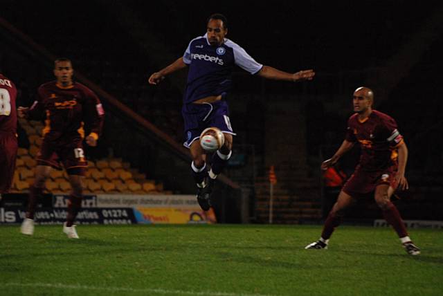 Chris O'Grady brings the ball down.