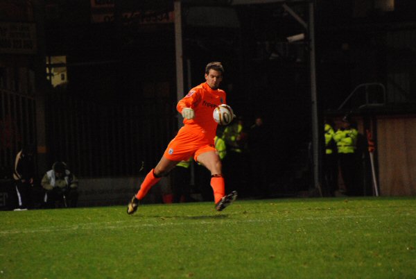 Tom Heaton punts the ball upfield.