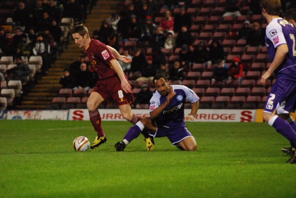 O'Grady slides in on Lee Bullock.