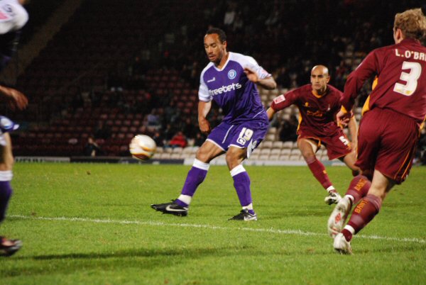 O'Grady receives the ball with his back to goal.