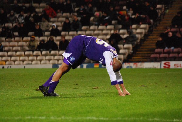 Thompson goes down after feeling a blow to the back of his leg, a knock that ultimately forced him to be substituted midway through the second half.