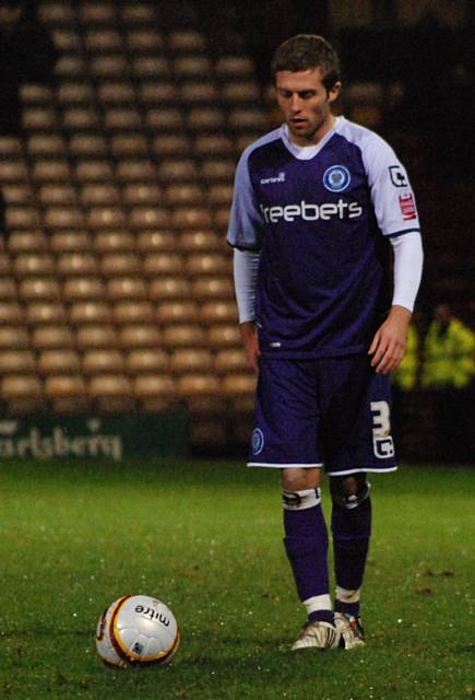 Tom Kennedy prepares to take a free kick.