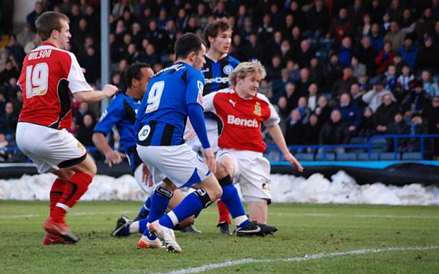 Chris O'Grady pounces to put Rochdale ahead.