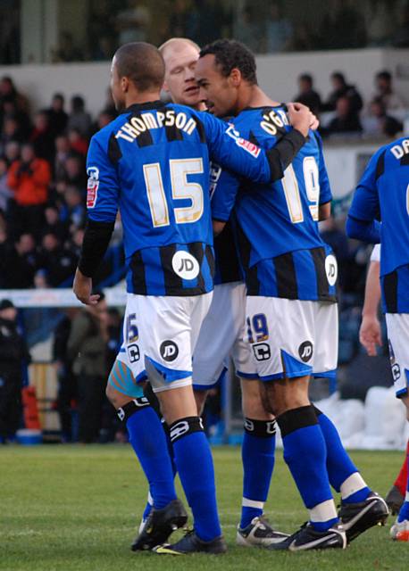 Thompson and Jason Kennedy join the celebrations with O'Grady.