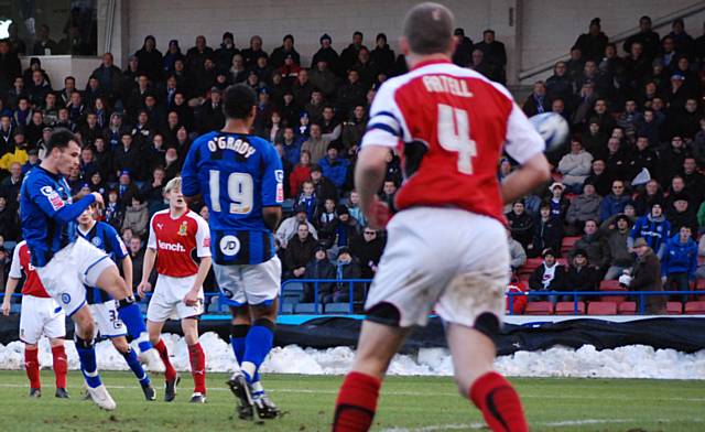 Dagnall cannons a shot off the crossbar.