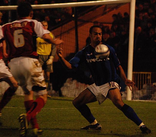 O'Grady brings the ball down inside the Morecambe box.