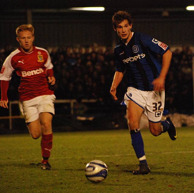 Atkinson drives Dale forward in search of a fourth goal.