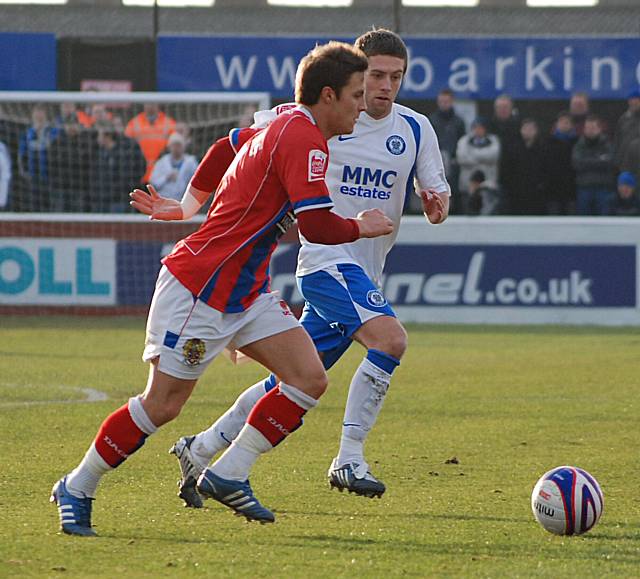 Sam Saunders takes on Tom Kennedy.