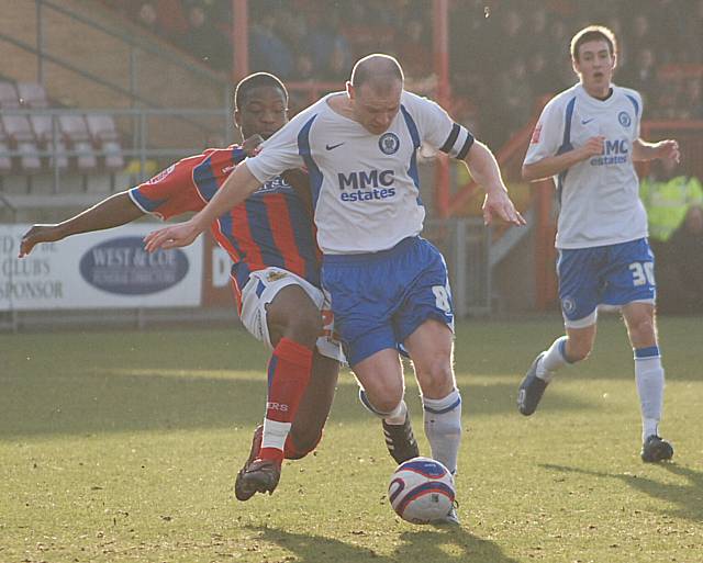 Solomon Taiwo puts in the tackle that gives Dale the free kick from which Tom Kennedy scores Dale's first.