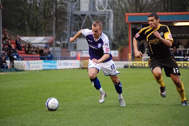 Kallum Higginbotham gets away from Colin Daniel.