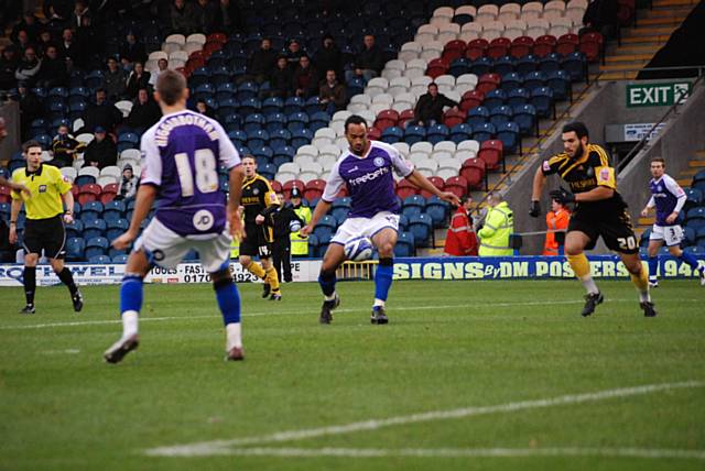 Chris O'Grady shapes to shoot when well placed in the Macclesfield box.