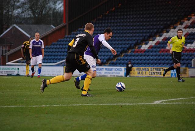 Dagnall lines up a shot from the edge of the box.