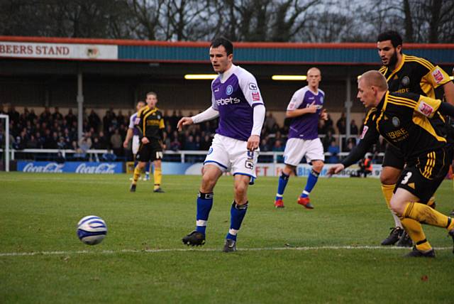 Dagnall spreads the play out wide.