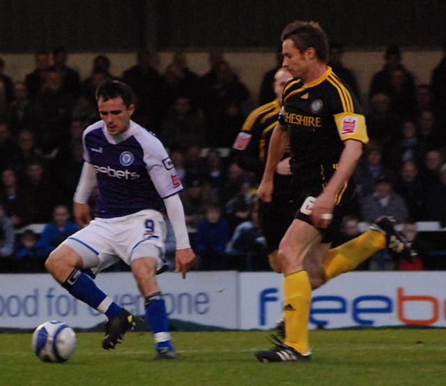 Dagnall maintains possession.