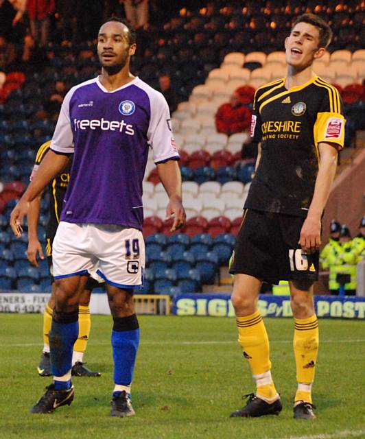 O'Grady and Brisley await a Dale corner.