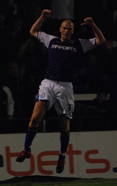 Taylor celebrates his injury time goal.