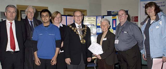 The Mayor of Rochdale, Councillor Keith Swift, with local carers and staff at Rochdale Infirmary on Friday.