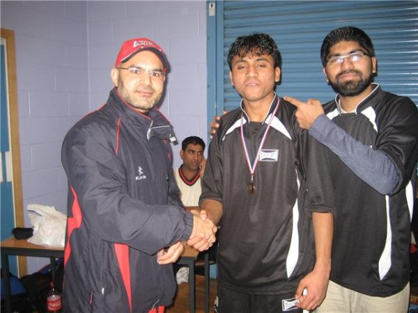 Rauf of Stoney Star receives his MOM Medal from Abdul Quyyom.