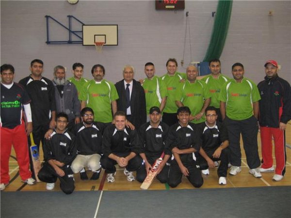 Ghulam Rasool Shehzad meeting players.