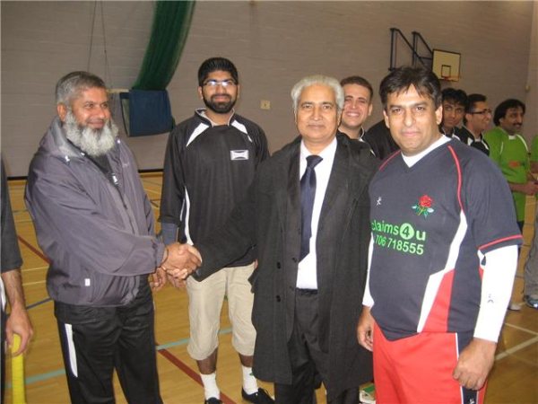 Ghulam Rasool Shehzad meeting players.