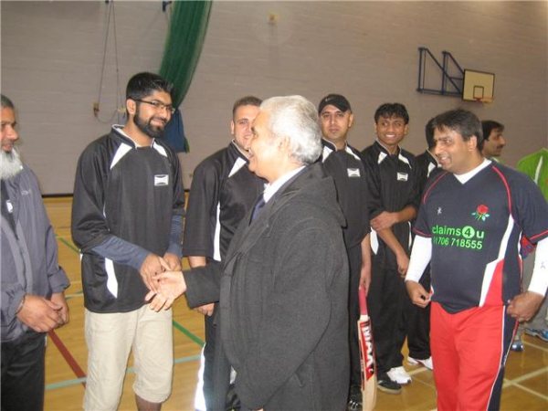 Ghulam Rasool Shehzad meeting players.