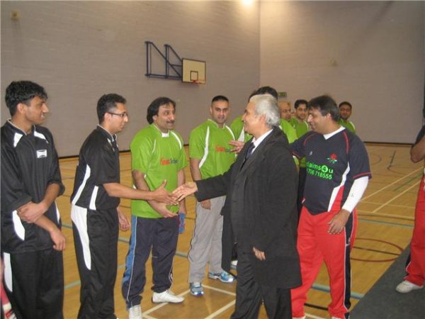 Ghulam Rasool Shehzad meeting players.