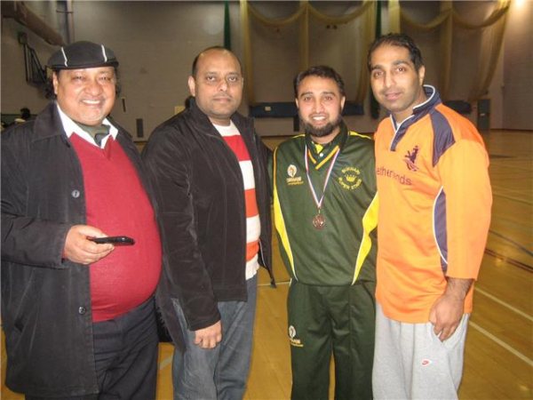 Bukhari with friends after receiving his MOM Medal.