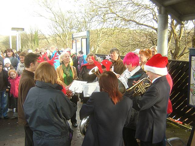 Littleborough Brass Band entertain passengers waiting for the train