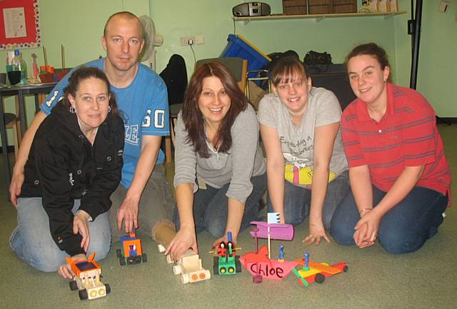 Parents Mandy Rowles, Steven Greenacre, Jo Phillips, Nikki Barker and Stacey Johnson show off their scrapheap challenge Christmas gifts.