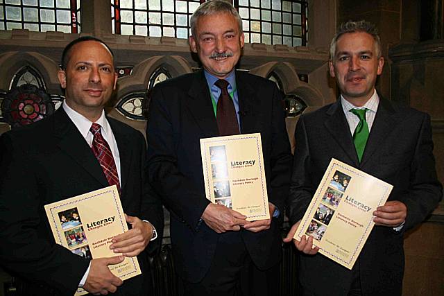 Louis Ferrante, Terry Piggott and Jonathan Douglas commemorate Rochdale's successful participation in the National Year of Reading.