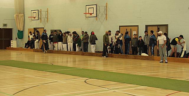 The teams get ready for action at the Matthew Moss Sports Centre.