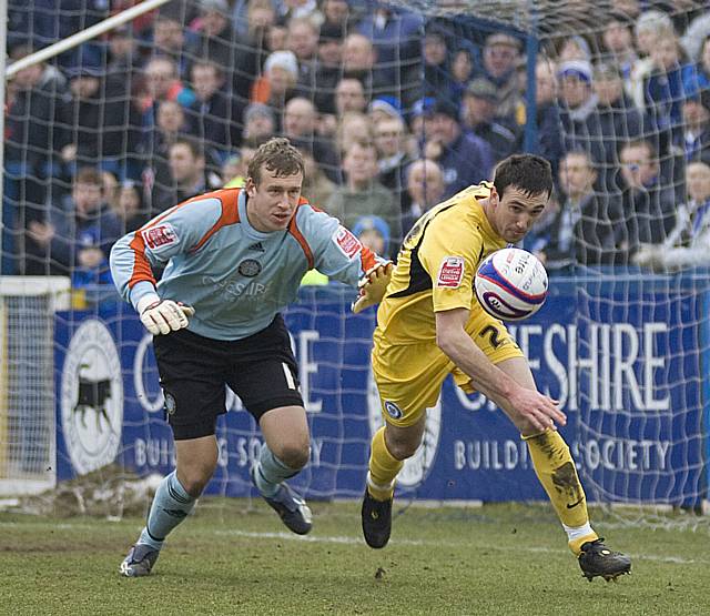 McArdle peels away from Jon Brain after the goalkeeper spills a Dale cross.