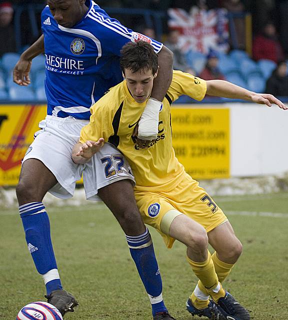 Brown gets to grips with Buckley.