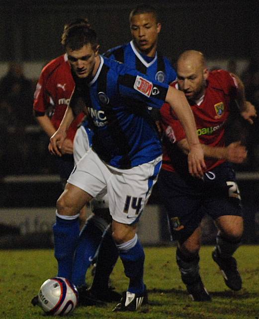 Scott Wiseman gets away from Danny Adams.