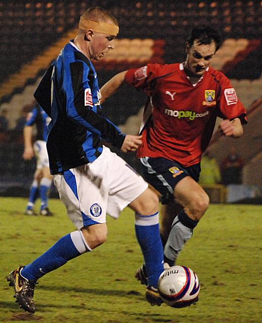 Adams takes on Stuart Drummond during last night's game.