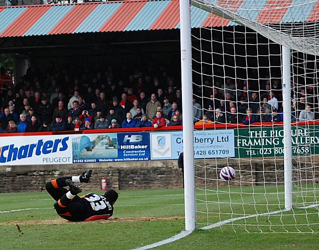 Dagnall's effort comes back off the post with Mikhael Jaimez Ruiz beaten.