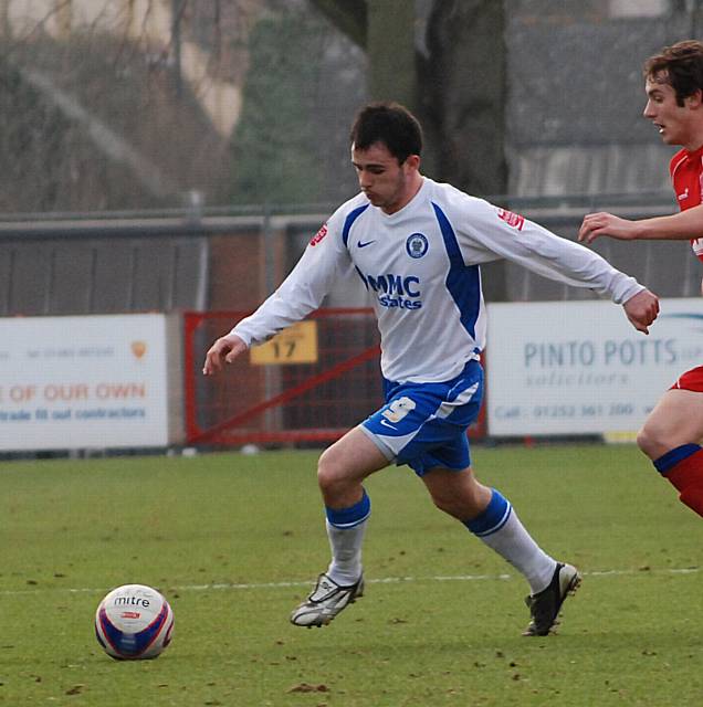 Dagnall breaks away from Hylton.